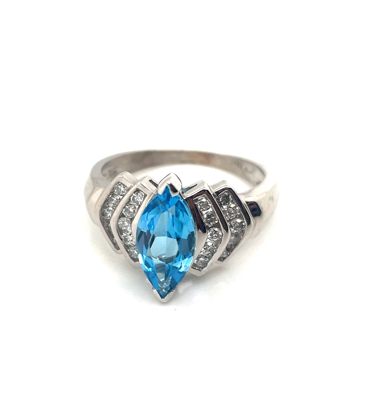 10k White Gold Topaz and 0.30 CT TW Diamonds Ring