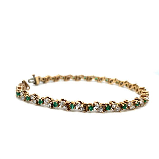14k Yellow Gold Emerald and 2.4 CT TW Diamonds Bracelet