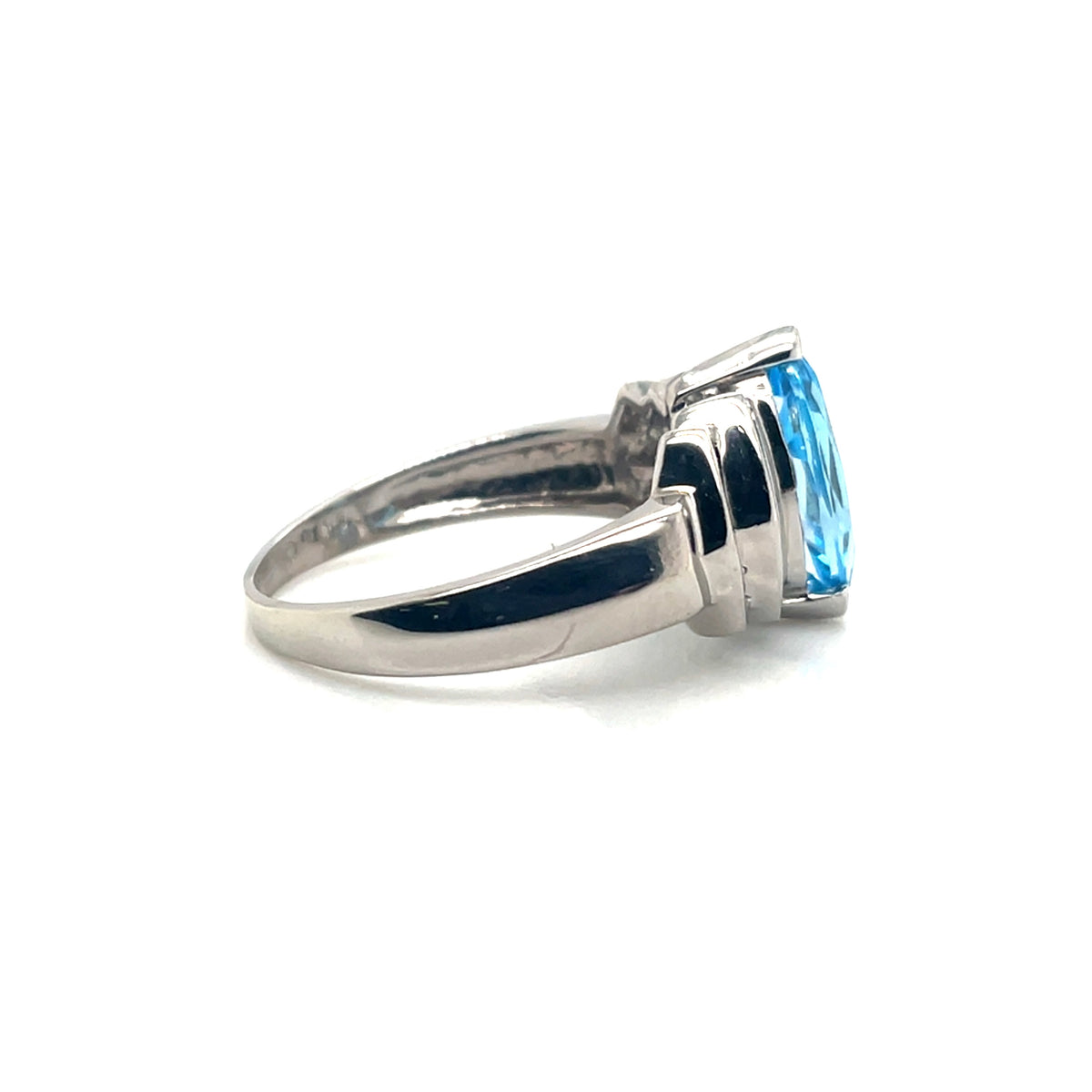 10k White Gold Topaz and 0.30 CT TW Diamonds Ring