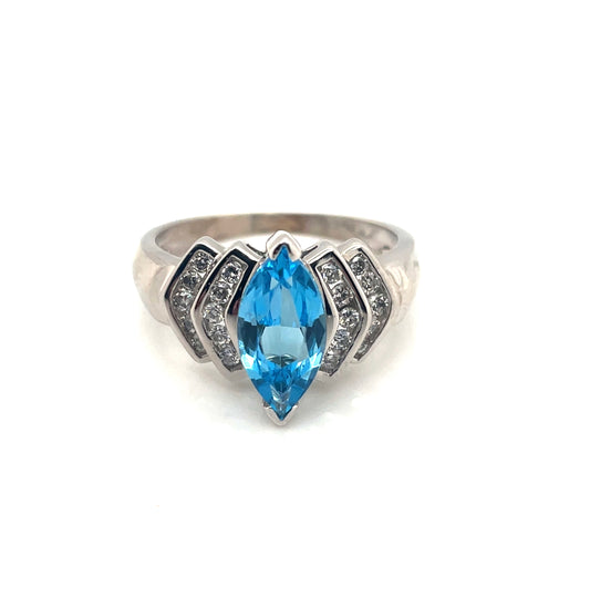 10k White Gold Topaz and 0.30 CT TW Diamonds Ring