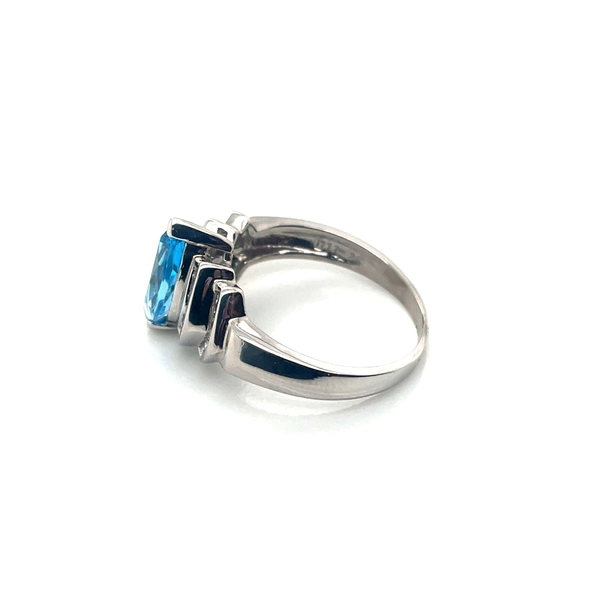 10k White Gold Topaz and 0.30 CT TW Diamonds Ring